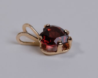 The Kids Collection 14K Yellow Gold Kid Boy with Deep Red Heart CZ January Birthstone Charm Pendant