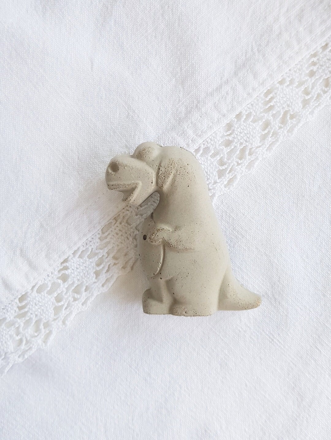 Aimant Béton Dinosaure