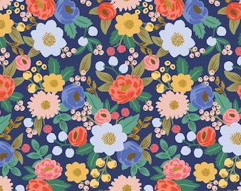 May include: A repeating pattern on a dark blue background featuring stylized flowers in shades of coral, light blue, yellow, and soft pink, interspersed with green leaves and small clusters of light blue and cream-colored berries.