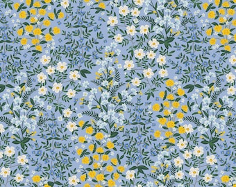 May include: A floral pattern featuring yellow roses, white daisies, and small blue flowers on a light blue background. Green leaves and stems intertwine throughout the design, creating a dense, all-over botanical print.