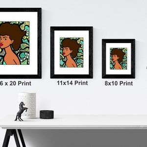 May include: Three framed prints of a colorful illustration of a woman with an afro hairstyle. The prints are in black frames and are displayed on a white shelf. The prints are labeled with their dimensions: 16 x 20, 11 x 14, and 8 x 10.