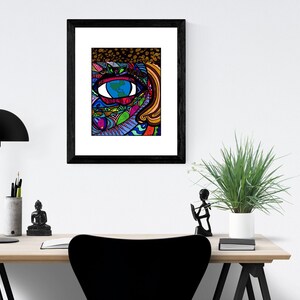 May include: A framed print of a colorful, abstract eye with a blue iris and a world map inside. The eye is surrounded by swirls and lines in shades of pink, purple, green, and yellow.