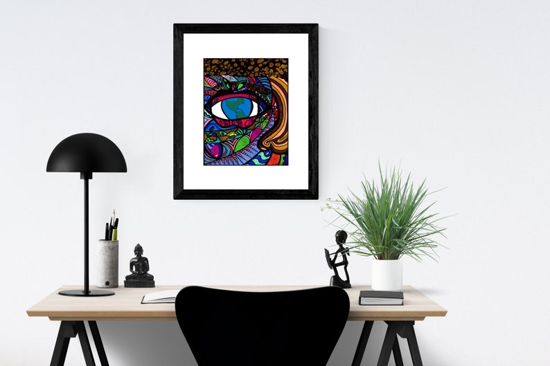 May include: A framed print of a colorful, abstract eye with a blue iris and a world map inside. The eye is surrounded by swirls and lines in shades of pink, purple, green, and yellow.