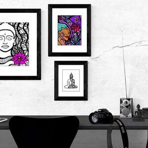 May include: Three black framed prints of line art drawings of Buddha. The top print features a woman with a lotus flower. The middle print features a woman with a lotus flower and the symbol Om. The bottom print features a seated Buddha.