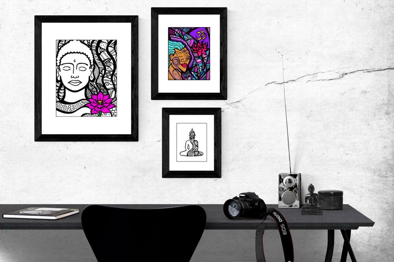 May include: Three black framed prints of line art drawings of Buddha. The top print features a woman with a lotus flower. The middle print features a woman with a lotus flower and the symbol Om. The bottom print features a seated Buddha.
