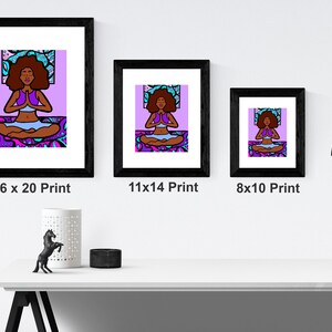 May include: Three framed prints of a digital illustration of a woman meditating in a lotus pose. The woman has dark skin, brown hair, and is wearing a purple top and blue pants. The background is a purple and blue mandala pattern. The prints are in black frames and are labeled with their dimensions: 16 x 20, 11 x 14, and 8 x 10.