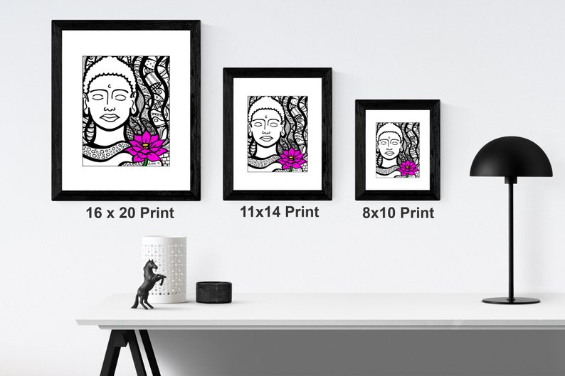 May include: Three black framed prints of a line drawing of a Buddha with a pink lotus flower. The prints are in different sizes: 16x20, 11x14, and 8x10 inches.