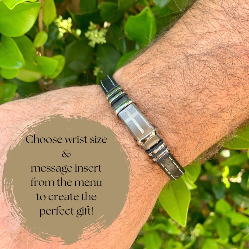 May include: A black leather bracelet with a silver cross charm. The bracelet has a stainless steel clasp and is adjustable. Choose your wrist size and message insert from the menu to create the perfect gift!