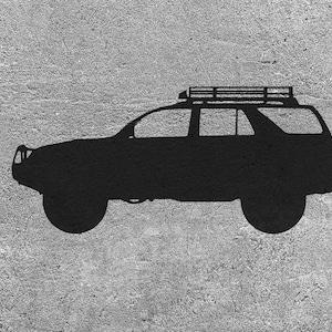 Puede incluir: Silueta de un SUV negro con un portaequipajes en un fondo gris texturizado.