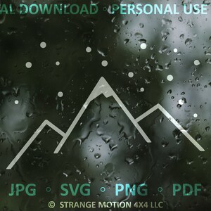 May include: A white outline of a mountain range with a peak on a dark background with white dots scattered around the mountain range. The text "JPG SVG PNG PDF" is below the mountain range. The text "STRANGE MOTION 4X4 LLC" is below the text "JPG SVG PNG PDF".