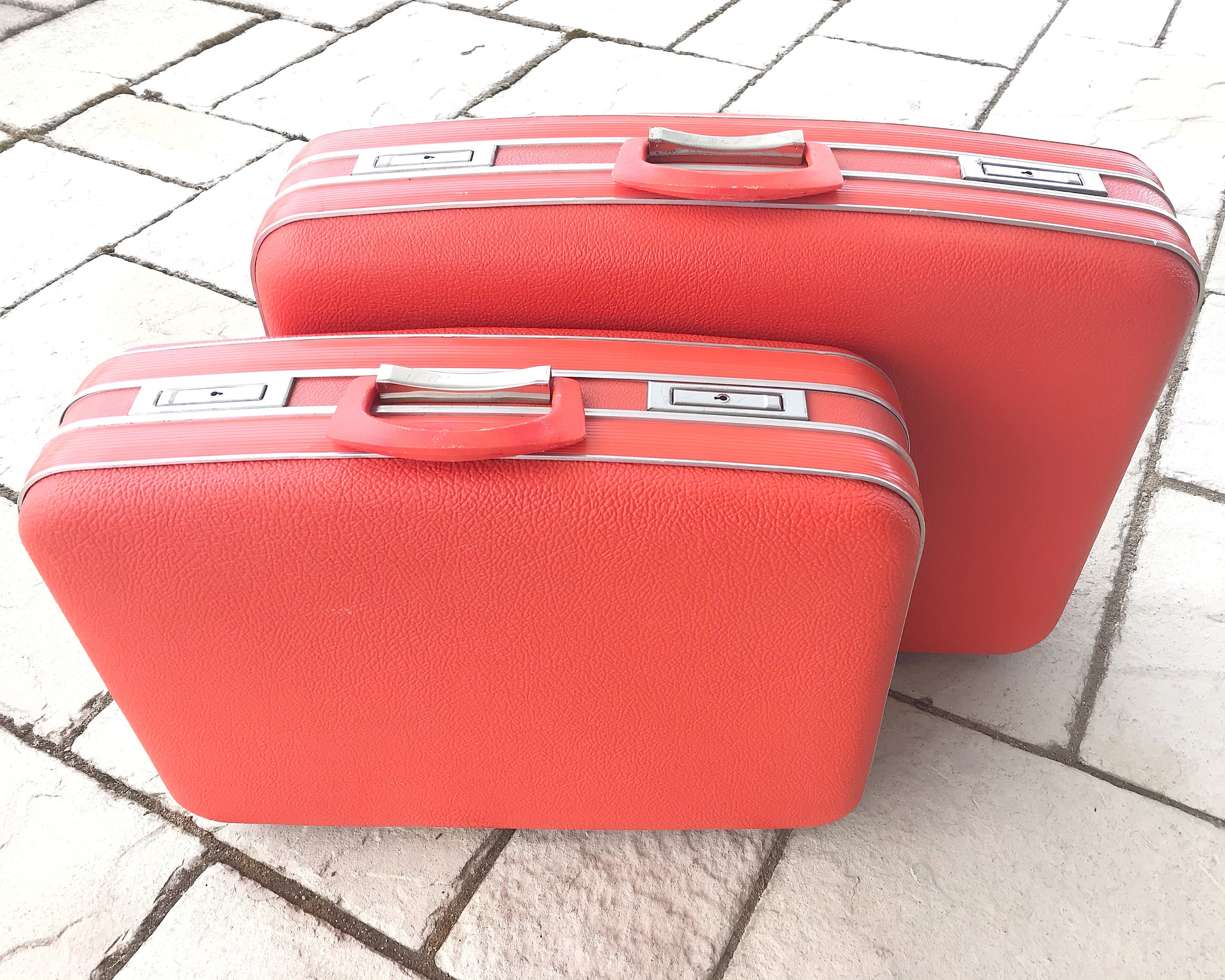 orange hard shell suitcase