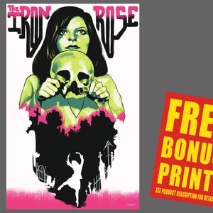May include: Poster featuring a woman holding a skull, with the text "THE IRON ROSE" in pink and black. The artwork includes a silhouette of a graveyard and a dancer. A red bonus print is included.