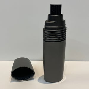 Dk Men Unleaded by Donna Karan Men Cologne 7ml Spray