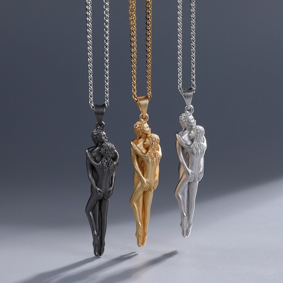 Embracing Romantic Couple Hug Woman Man in Silver Gold Black
