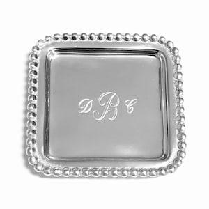 May include: A silver square tray with a beaded border and the initials "D.B.C." engraved in the center.