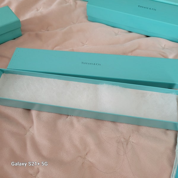 Vintage empty Tiffany box for bracelet or watch. Just a box with tissue.  9 inches long.