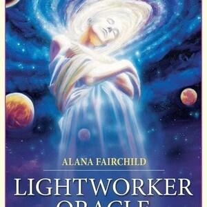 May include: The Lightworker Oracle deck box features a central figure with eyes closed, wrapped in white fabric against a swirling blue cosmic background with planets. Text reads: ALANA FAIRCHILD, LIGHTWORKER ORACLE, Guidance & Empowerment for those Who Love the Light.
