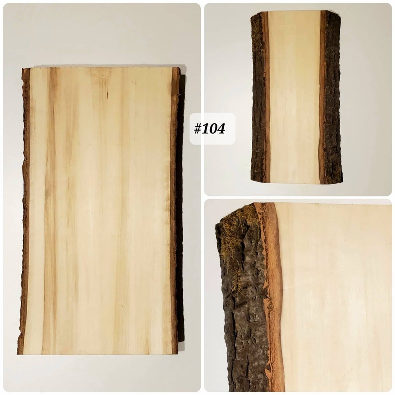 Puede incluir: Una rebanada de madera de color marr&oacute;n claro con un borde de corteza natural. La madera tiene una superficie lisa y un patr&oacute;n de veta claro. #104