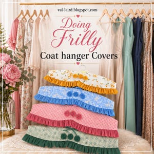 May include: Four fabric coat hanger covers stacked vertically, each featuring a ruffled bottom edge and three small fabric rosettes at the center. The patterns include yellow floral, blue floral, pink geometric, and green geometric designs.