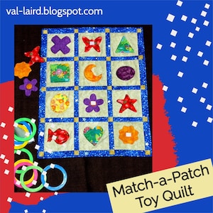 May include: A colorful, quilted play mat with a variety of shapes and designs. The mat is made of fabric and has a blue background with white stars. The shapes include a butterfly, a heart, a star, a moon, a flower, a fish, and a circle. The mat is labeled "Match-a-Patch Toy Quilt".