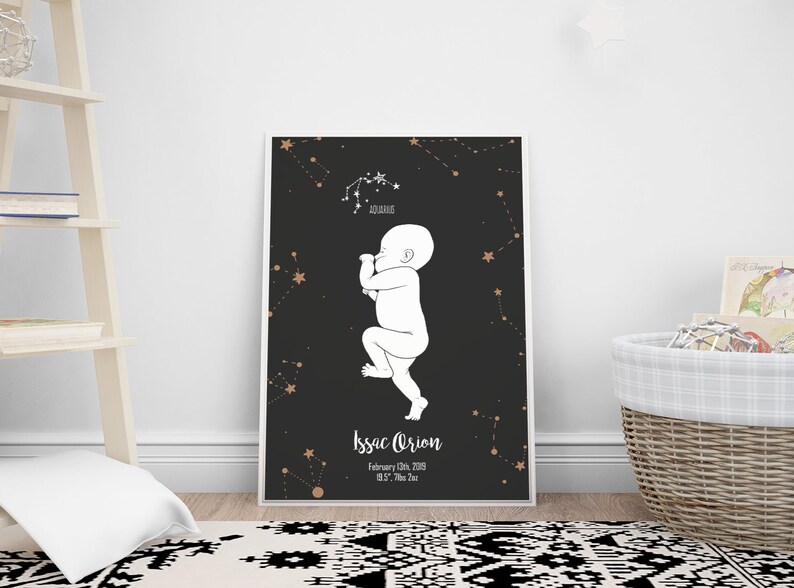 May include: Black and gold printable poster with a white outline of a baby in a fetal position. The poster features the constellation Aquarius and the text "Issac Orion, February 13th, 2019, 8:57, 7 lbs 2 oz."