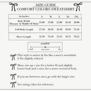 May include: Size chart for a unisex sweatshirt in sizes small to 2XL. The chart shows measurements in inches for body width, full body length, and sleeve length. The chart also includes a note that the style fits like a men's sweatshirt and fits slightly relaxed.