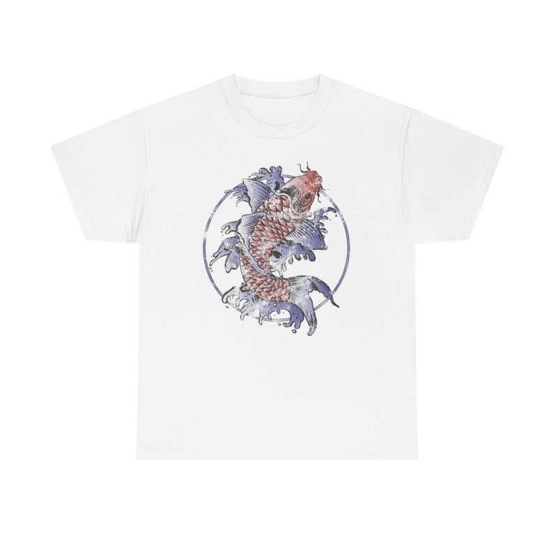 May include: White t-shirt with a graphic of a red and white koi fish swimming in a circle of blue water.