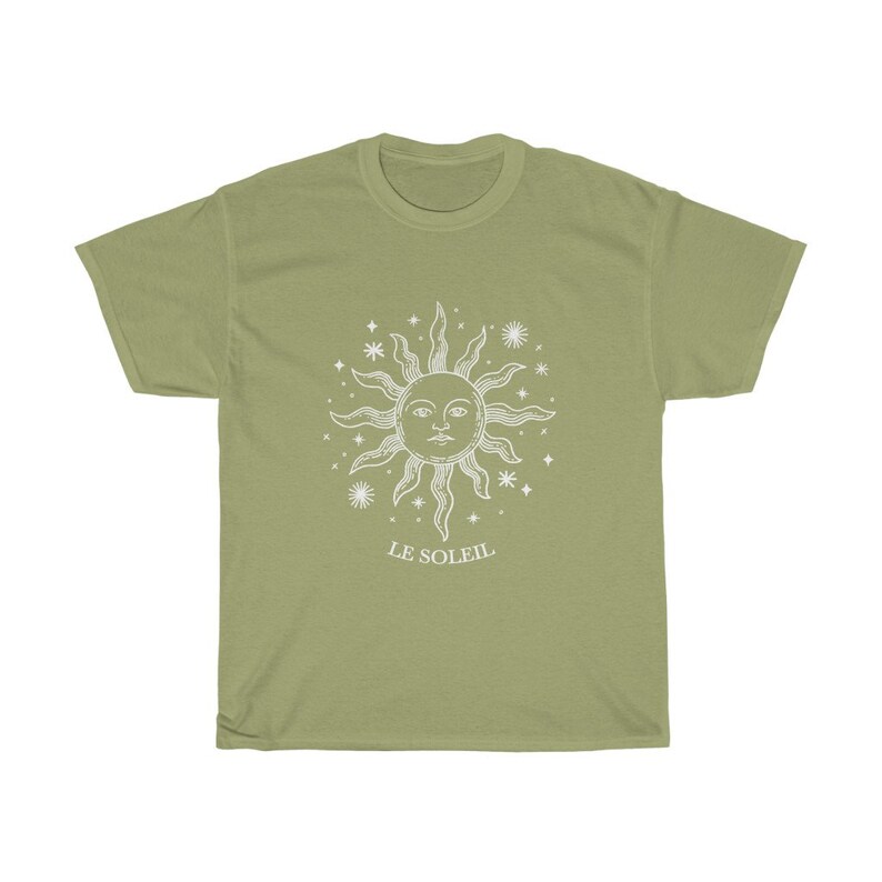 May include: A light green t-shirt with a white sun and stars graphic and the text "LE SOLEIL" printed on the front.