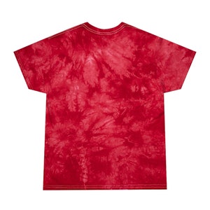May include: Red tie-dye t-shirt with a crew neck and short sleeves.
