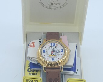 Vintage Lorus Disney Mickey Minnie
Musical Watch Plays I Want to Hold Your Hand Musical Lorus Disney Beatles Song  main image 4