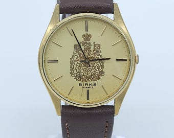 Orologio vintage Birks Gold unisex al quarzo con logo Canadian Arms placcato oro