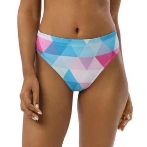 May include: High-waisted bikini bottoms with a geometric pattern. The bottoms feature a design of blue, pink, and white triangles. The swimwear is designed for comfort and style.