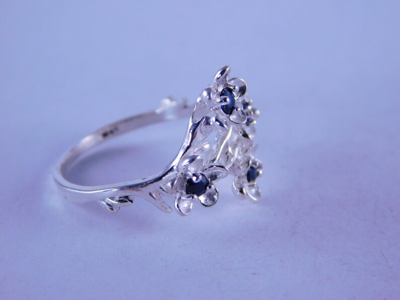D63467 Sterling Sliver Size 7.25 5 2.5MM Sapphires