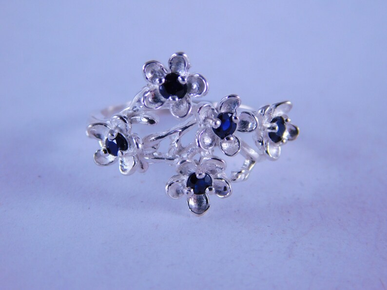 D63467 Sterling Sliver Size 7.25 5 2.5MM Sapphires