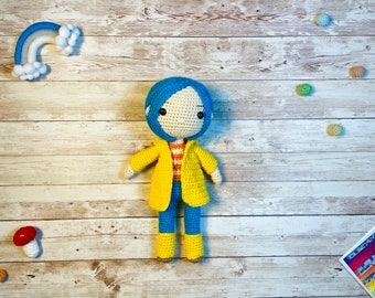 Crochet doll blue in pants and dress up coat