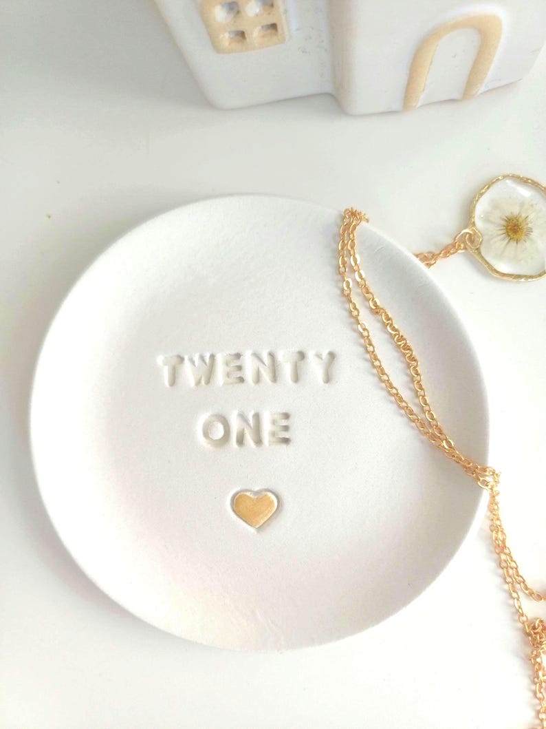 Handmade clay trinket dish embossed with twenty one and a handpainted heart which can be painted in a choice of colours