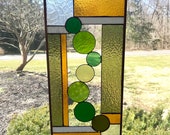 Stained glass panel with copper frame.