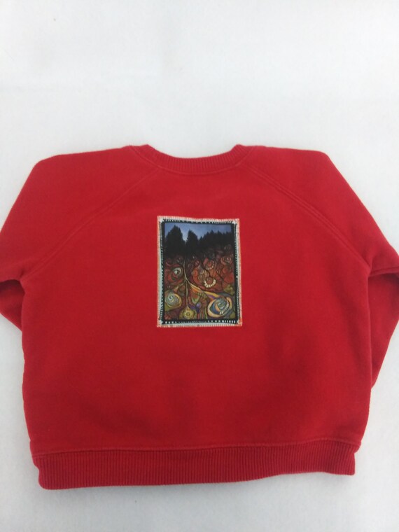 red pullover sweatshirt