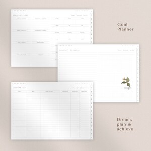 May include: A printable goal planner with sections for long-term goals, goals and intentions, a bucket list, and a vision board. The planner has a grid pattern and a floral illustration.