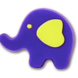 May include: Purple elephant-shaped rubber stamp with a yellow ear and a small white dot for an eye.