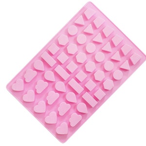 May include: Pink silicone mold with various shapes including hearts, clouds, teardrops, circles, squares, triangles, hexagons, and pentagons.