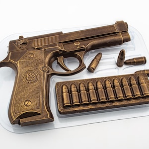 VAPENFORM (en annan sida), chokladform för pistol och kulor, tvålform, tårtdekoration med jägartema, godisform för hagelgevär, skjutvapenform, fars dag