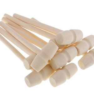 May include: A set of ten wooden mallets with smooth, rounded heads and long, slender handles. The mallets are arranged in a pile, with the heads facing up.