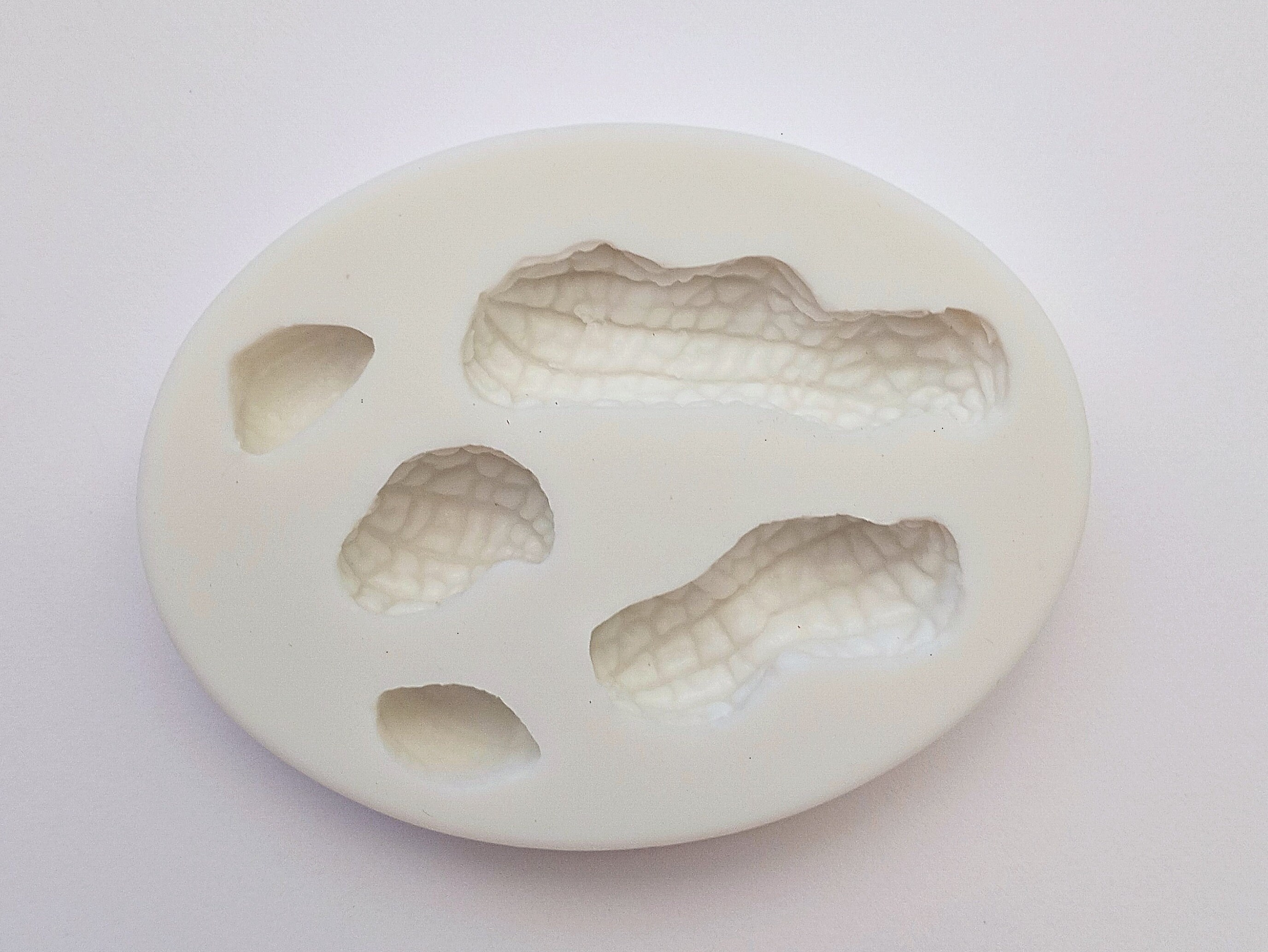 thumbnail image 2 of Molds N More Snoopy Woodstock Bite Size Pieces Chocolate Soap Candy Mold – 4 Cupcakes 2 of 4
