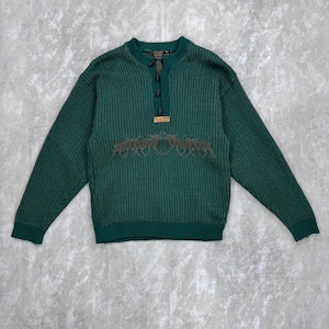 May include: A set of three ceramic mugs with a speckled, matte finish. The mugs are in shades of cream, light gray, and dark gray. Each mug has a simple, minimalist design and a rounded handle. The mugs are stacked on top of each other.