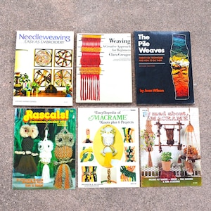 May include: Six instructional craft books arranged in two rows. Titles include Needleweaving Easy as Embroidery, Weaving A Creative Approach for Beginners, The Pile Weaves, Rascals! 3-Dimensional Macrame Owls, Encyclopedia of Macrame, and Mad About Macrame.