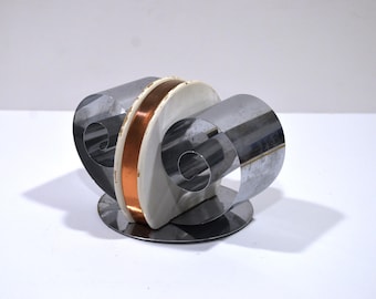 Art Deco "Double Scroll" Bookend Holder Designed by Fred D. Farr for Revere Copper and Brass Co, circa 1935.
