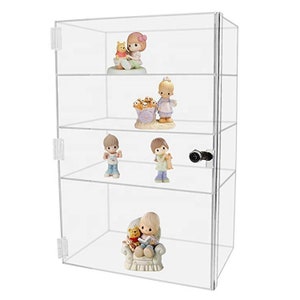 May include: A clear acrylic display case with four shelves for displaying figurines. The case has a lock and a clear door. The case is empty, but there are five figurines on the shelves, including a girl reading a book, a girl with a basket of flowers, a girl with a teddy bear, a girl with a basket of flowers, and a girl with a teddy bear.