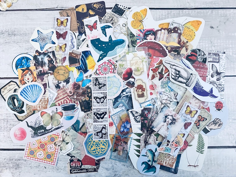 May include: A collection of colorful and whimsical stickers featuring various designs, including butterflies, flowers, animals, and abstract patterns. The stickers are perfect for adding a touch of personality to journals, planners, laptops, and other surfaces.