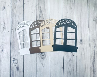 A set of 4 windows die cuts for card making, scrapbooking and junk journaling.